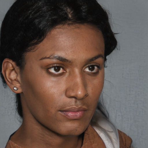 Neutral black young-adult female with short  brown hair and brown eyes