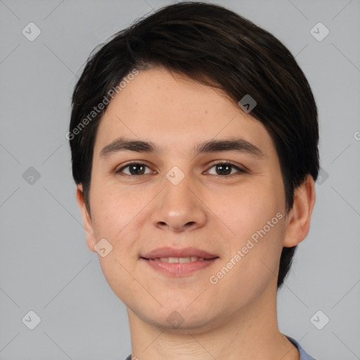 Joyful white young-adult male with short  black hair and brown eyes