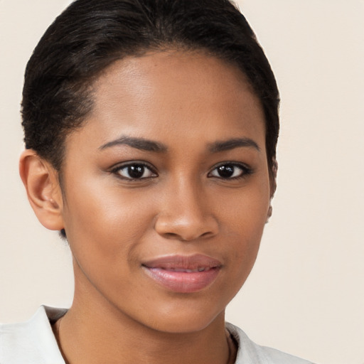 Joyful latino young-adult female with short  brown hair and brown eyes