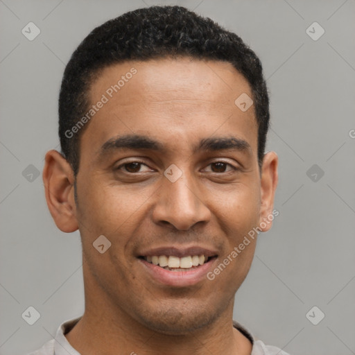 Joyful latino young-adult male with short  brown hair and brown eyes