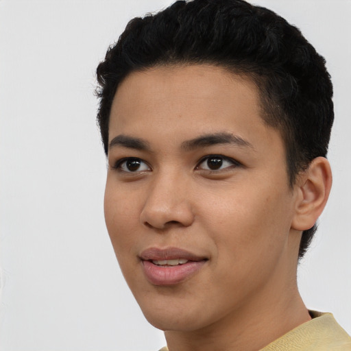 Joyful asian young-adult female with short  black hair and brown eyes
