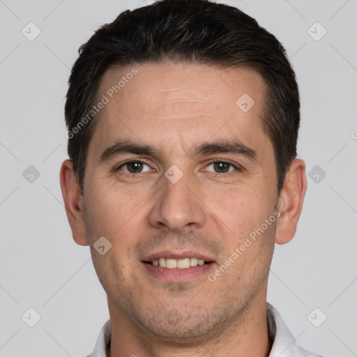 Joyful white adult male with short  brown hair and brown eyes