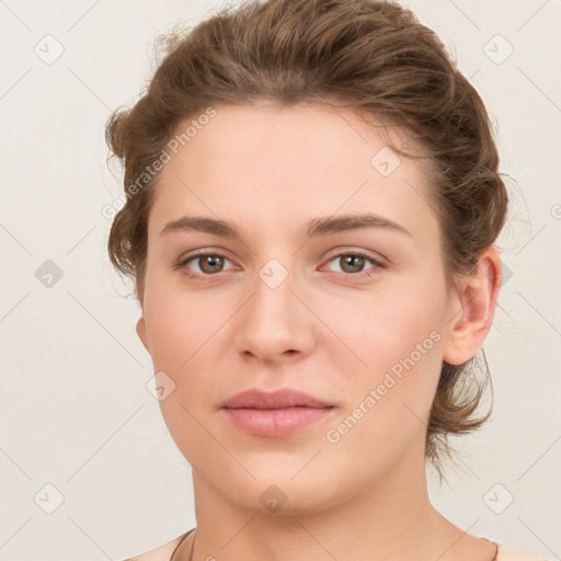 Neutral white young-adult female with short  brown hair and brown eyes