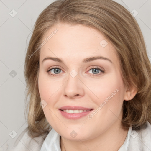 Joyful white young-adult female with medium  brown hair and blue eyes