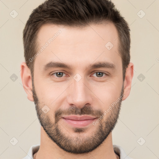 Joyful white young-adult male with short  brown hair and brown eyes