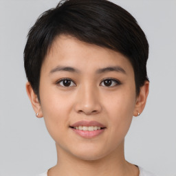 Joyful asian young-adult female with short  brown hair and brown eyes