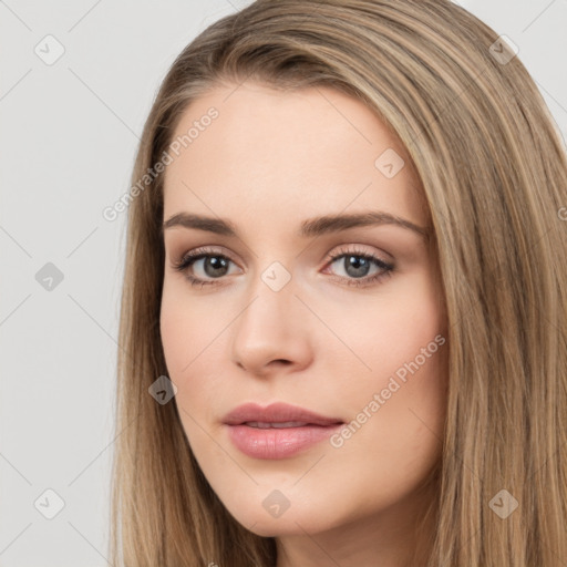 Neutral white young-adult female with long  brown hair and brown eyes