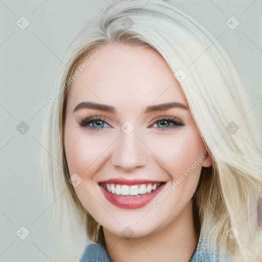 Joyful white young-adult female with long  brown hair and blue eyes