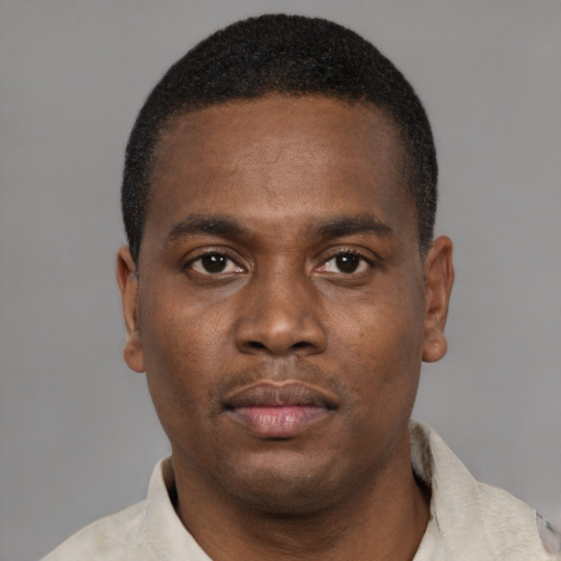 Neutral latino young-adult male with short  brown hair and brown eyes
