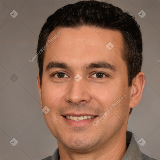 Joyful white young-adult male with short  black hair and brown eyes