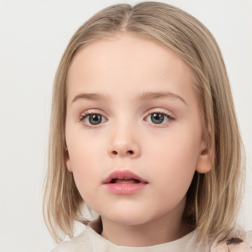 Neutral white child female with medium  brown hair and grey eyes