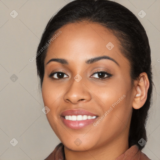 Joyful latino young-adult female with medium  brown hair and brown eyes