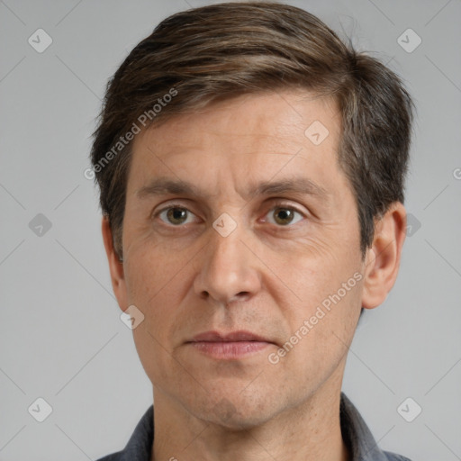 Neutral white adult male with short  brown hair and brown eyes