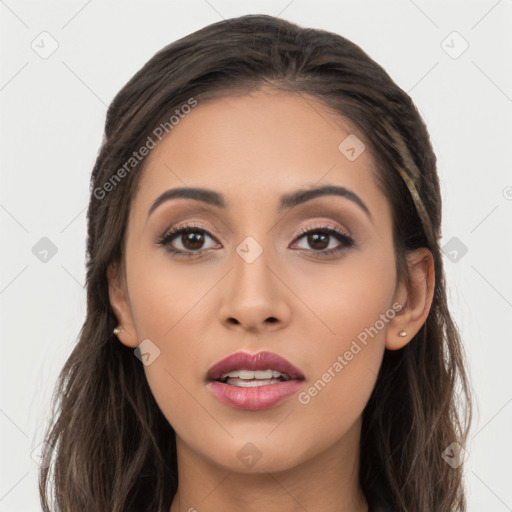 Joyful white young-adult female with long  brown hair and brown eyes