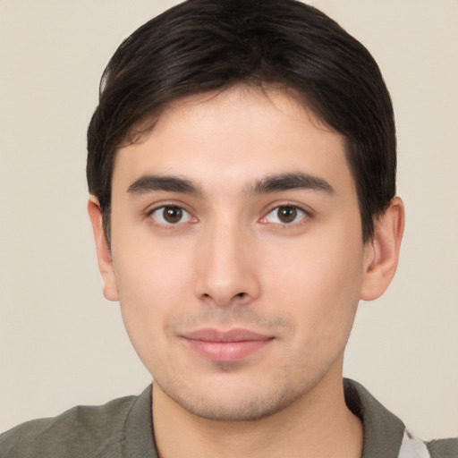 Neutral asian young-adult male with short  brown hair and brown eyes