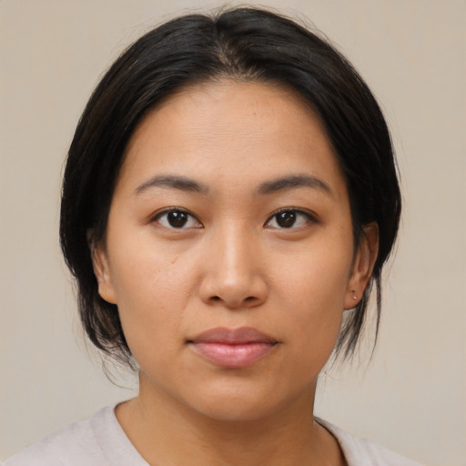 Neutral asian young-adult female with medium  black hair and brown eyes