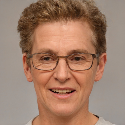 Joyful white middle-aged male with short  brown hair and brown eyes