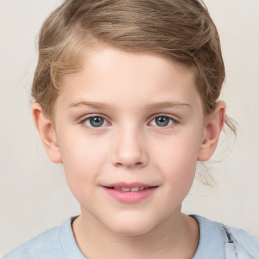 Joyful white child male with short  brown hair and grey eyes