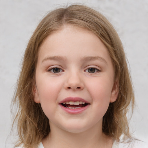 Joyful white child female with medium  brown hair and blue eyes