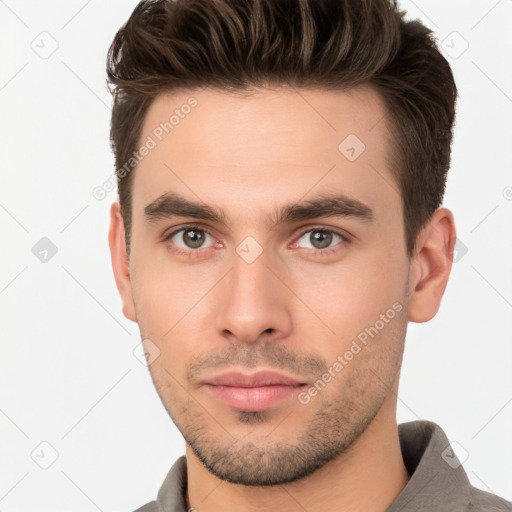 Neutral white young-adult male with short  brown hair and brown eyes