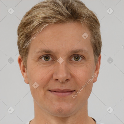 Joyful white adult female with short  brown hair and grey eyes