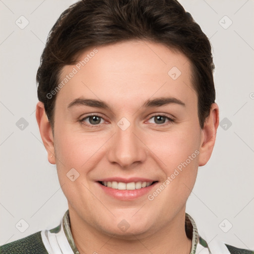 Joyful white young-adult female with short  brown hair and grey eyes