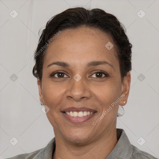 Joyful white adult female with short  brown hair and brown eyes