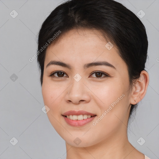 Joyful white young-adult female with medium  brown hair and brown eyes