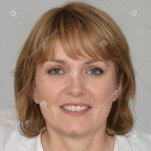 Joyful white young-adult female with medium  brown hair and blue eyes