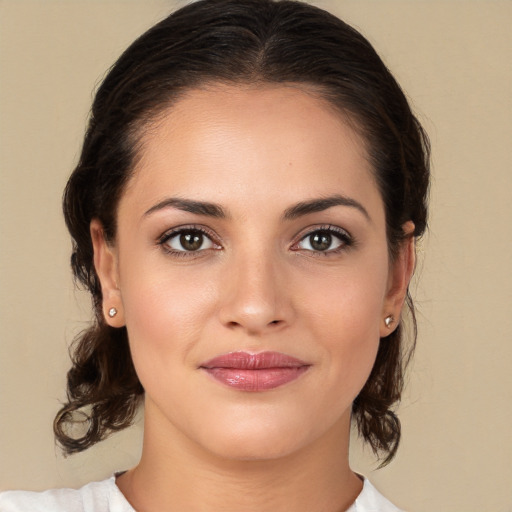 Joyful white young-adult female with medium  brown hair and brown eyes