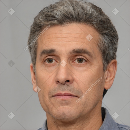 Neutral white middle-aged male with short  brown hair and brown eyes