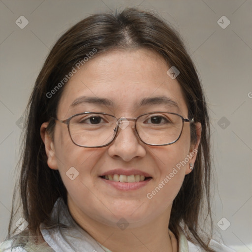 Joyful white adult female with medium  brown hair and brown eyes