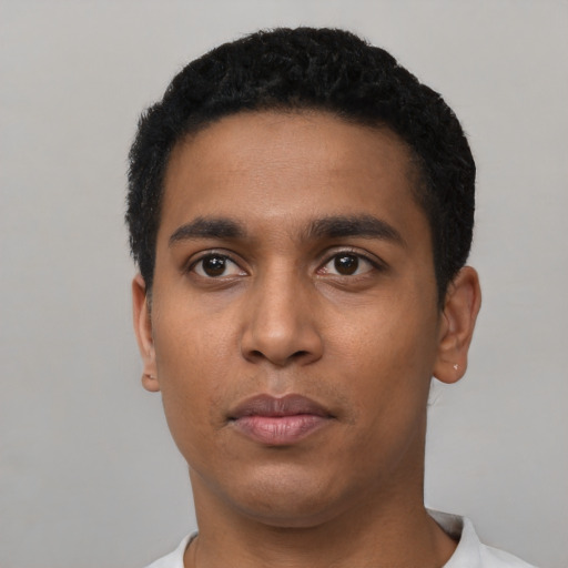 Neutral latino young-adult male with short  black hair and brown eyes