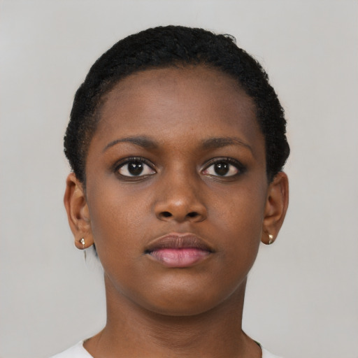 Neutral black young-adult female with short  brown hair and brown eyes