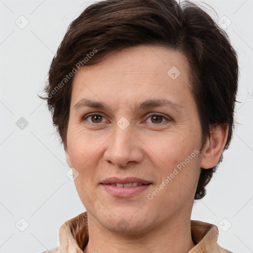 Joyful white adult female with short  brown hair and brown eyes