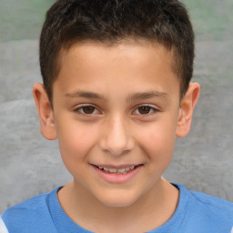 Joyful white child male with short  brown hair and brown eyes