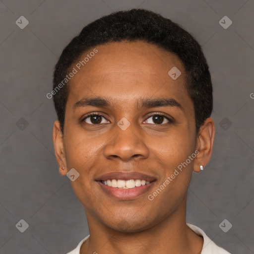 Joyful black young-adult male with short  black hair and brown eyes