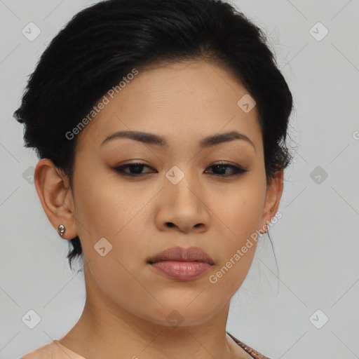 Joyful asian young-adult female with short  black hair and brown eyes