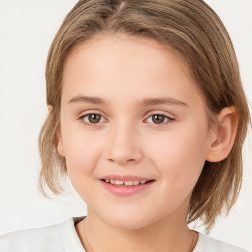 Joyful white child female with medium  brown hair and brown eyes