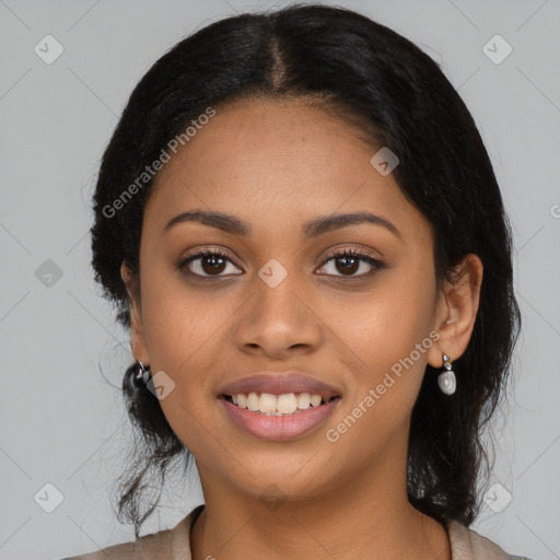 Joyful latino young-adult female with long  black hair and brown eyes