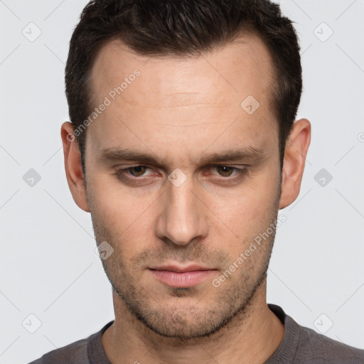 Neutral white adult male with short  brown hair and brown eyes