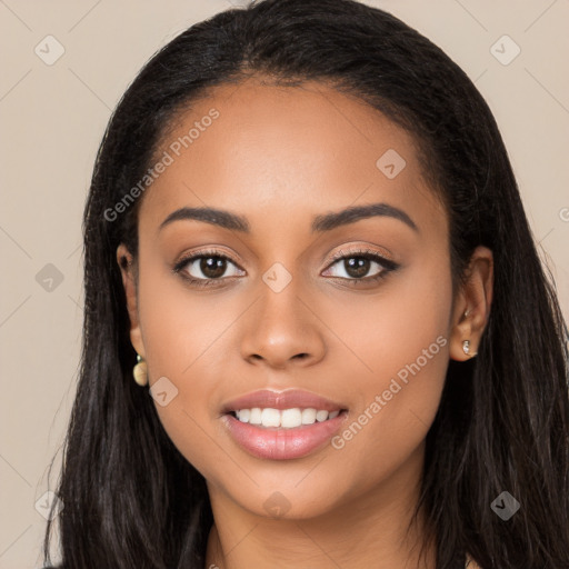 Joyful latino young-adult female with long  black hair and brown eyes