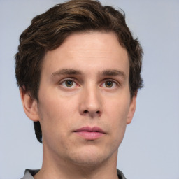 Neutral white young-adult male with short  brown hair and grey eyes