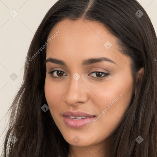 Joyful latino young-adult female with long  brown hair and brown eyes