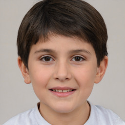 Joyful white child female with short  brown hair and brown eyes