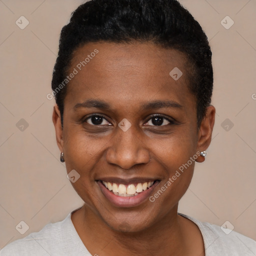 Joyful black young-adult female with short  brown hair and brown eyes