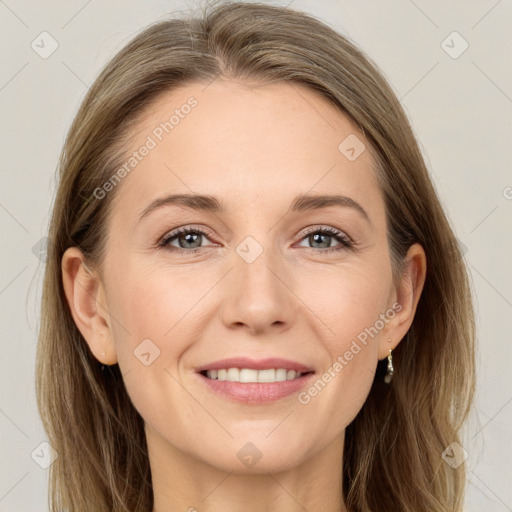 Joyful white young-adult female with long  brown hair and grey eyes