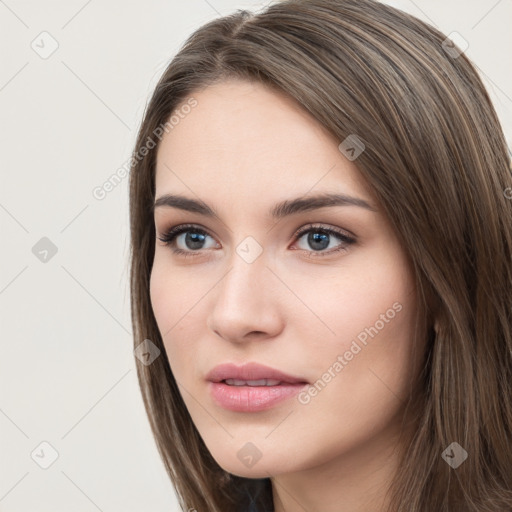 Neutral white young-adult female with long  brown hair and brown eyes