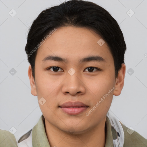 Joyful asian young-adult male with short  black hair and brown eyes