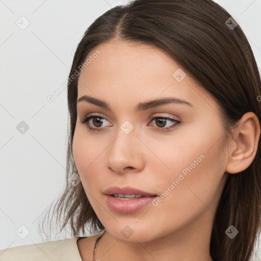 Neutral white young-adult female with long  brown hair and brown eyes